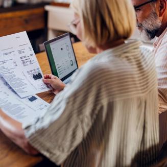 Older couple looking at energy bills